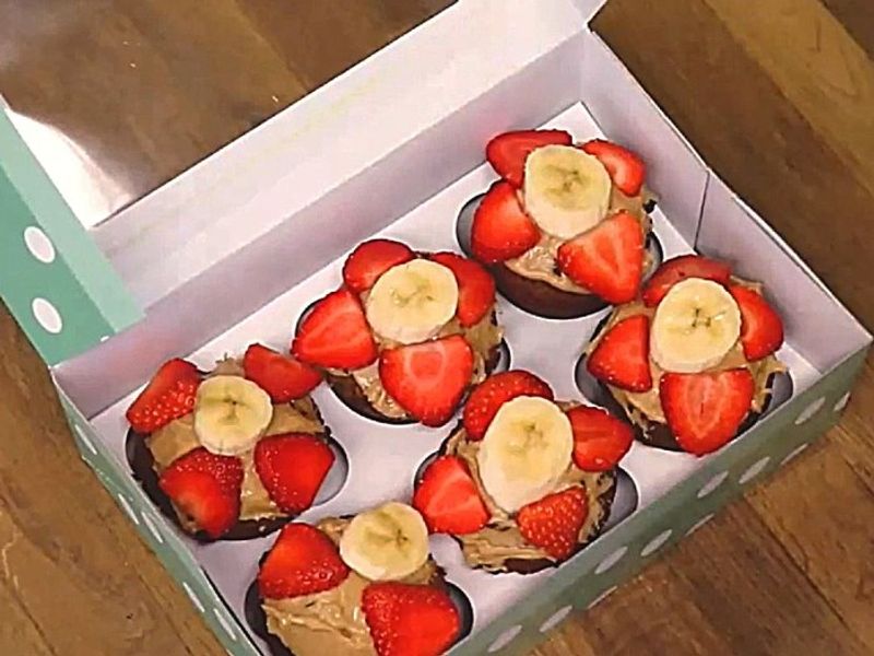 Peanut butter, banana and strawberry cupcakes in box