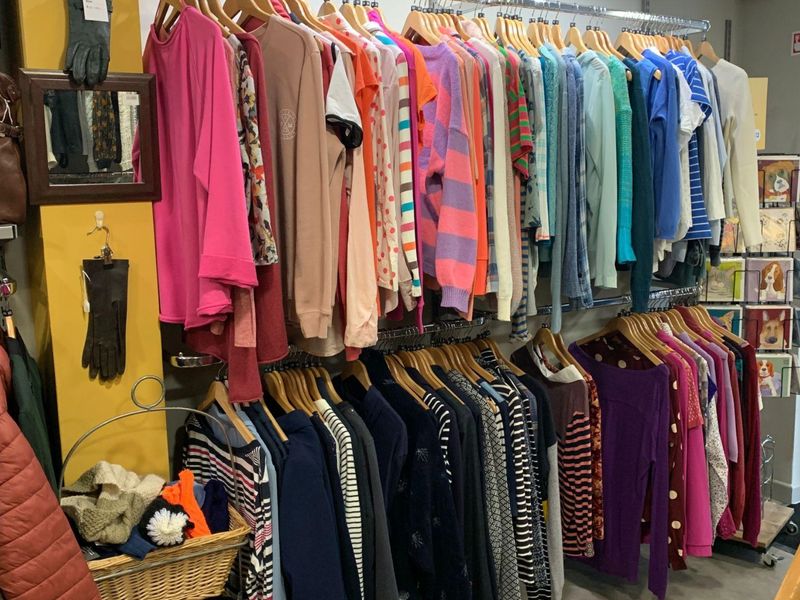 Image taken of shirts hanging up inside the Winchester charity shop. 