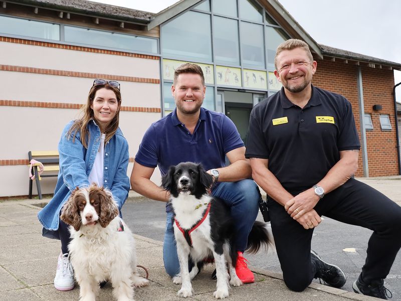Fundraiser Simon Wilkes with his wife Kim and Supporter Relations Officer Sean Daly outside Dogs Trust Leeds with doggy duo Lucy and Mally.